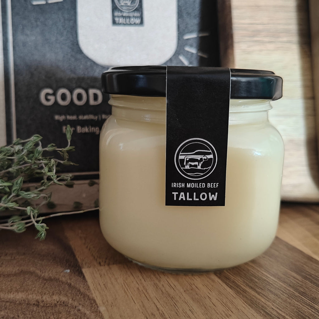 Jar of tallow with a label on a wooden surface
