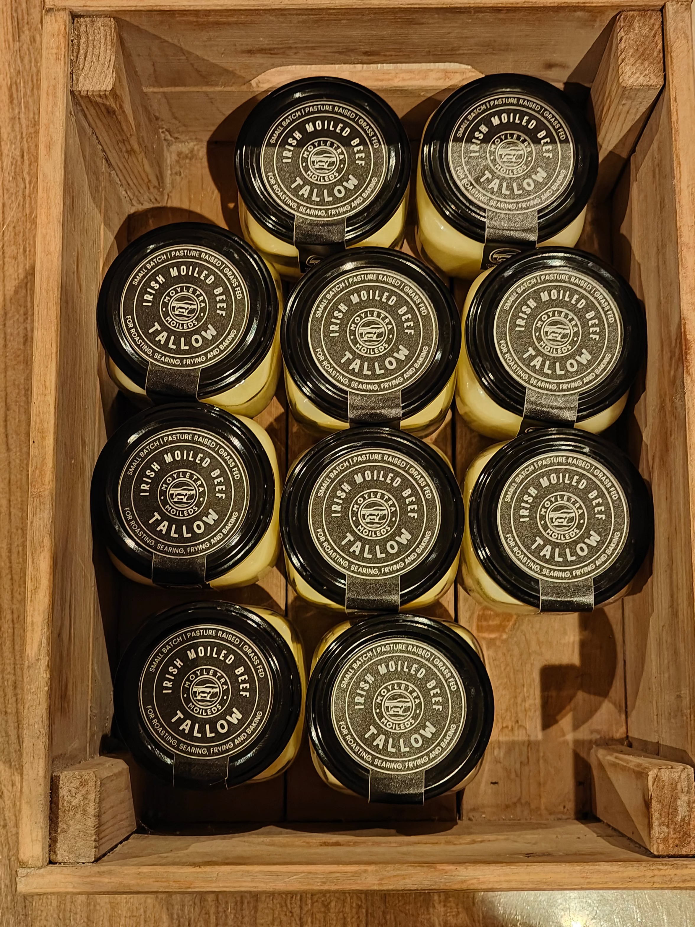 irish moiled beef tallow jars in a wooden crete