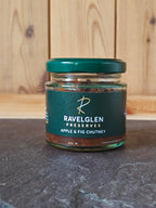 Jar of Ravelglen Preserves Apple & Fig Chutney on a wooden surface