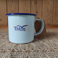 White mug with blue rim and Falcon Housewares logo on a textured surface.